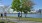 Charles River walking path near our apartments in Boston, featuring two people walking and a runner on the path.