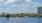 Sailboats in the Charles River with city skyline in the background.