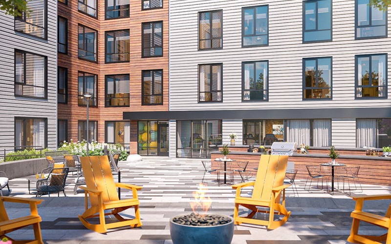 Resident courtyard with lounge chairs and fire pit